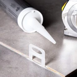 Juvale 400 Pack Tile Leveling Clips Reusable Plastic Leveling Spacer Clips (White, 1/32 Inch) -Household Items af54d660 04e9 4884 862e d13c69d091af.beecc63a5d0759f27fa3a38d714eb171 1800x1800